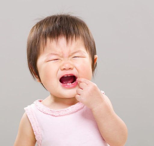 Mọc răng có thể khiến bé 20 tháng tuổi lười ăn